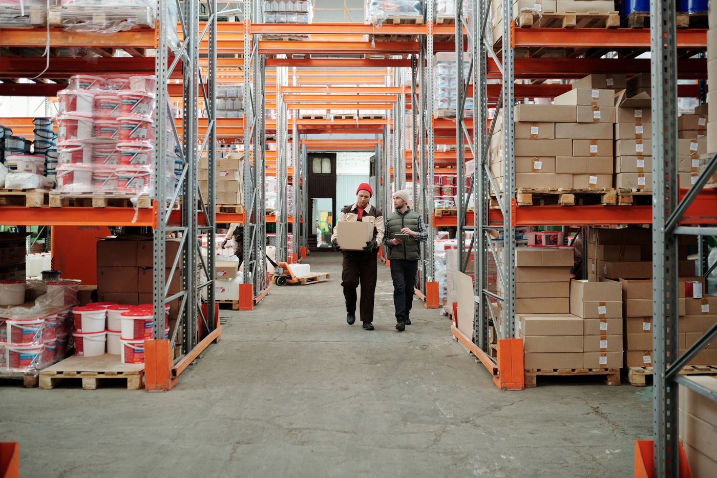 Roll-Lux warehouse with organized shelves and boxes of hospitality supplies